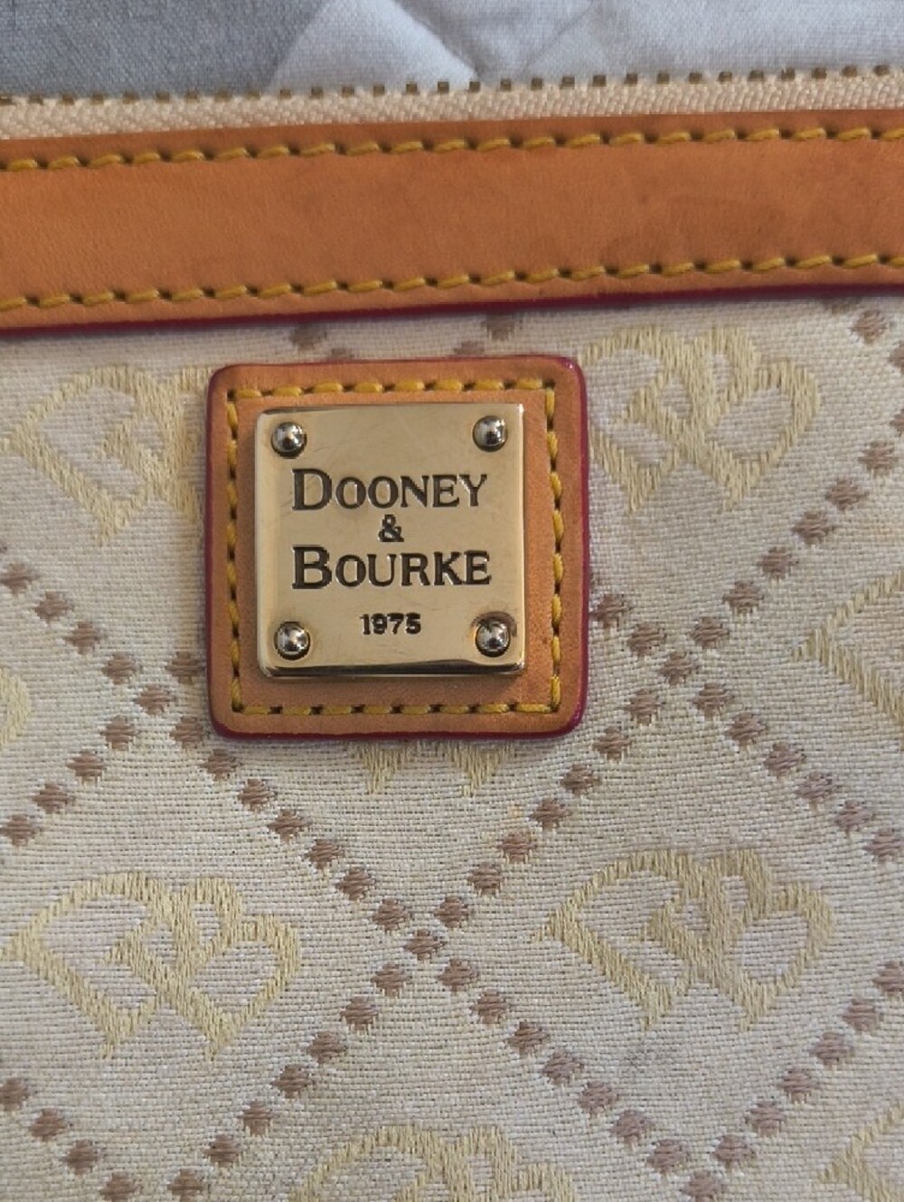 Dooney & Bourke Cream Canvas Wristlet with Tan Leather Trim and Gold Hardware - Picture 2 of 10